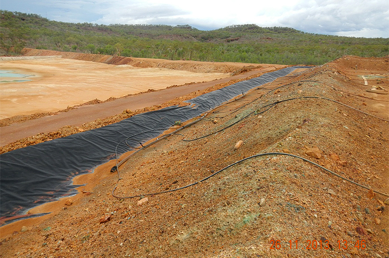 View of the heap leach pad and associated irrigation system on the right and part of the tailings dam to the left (2013) View of the heap leach pad and associated irrigation system on the right and part of the tailings dam to the left (2013)